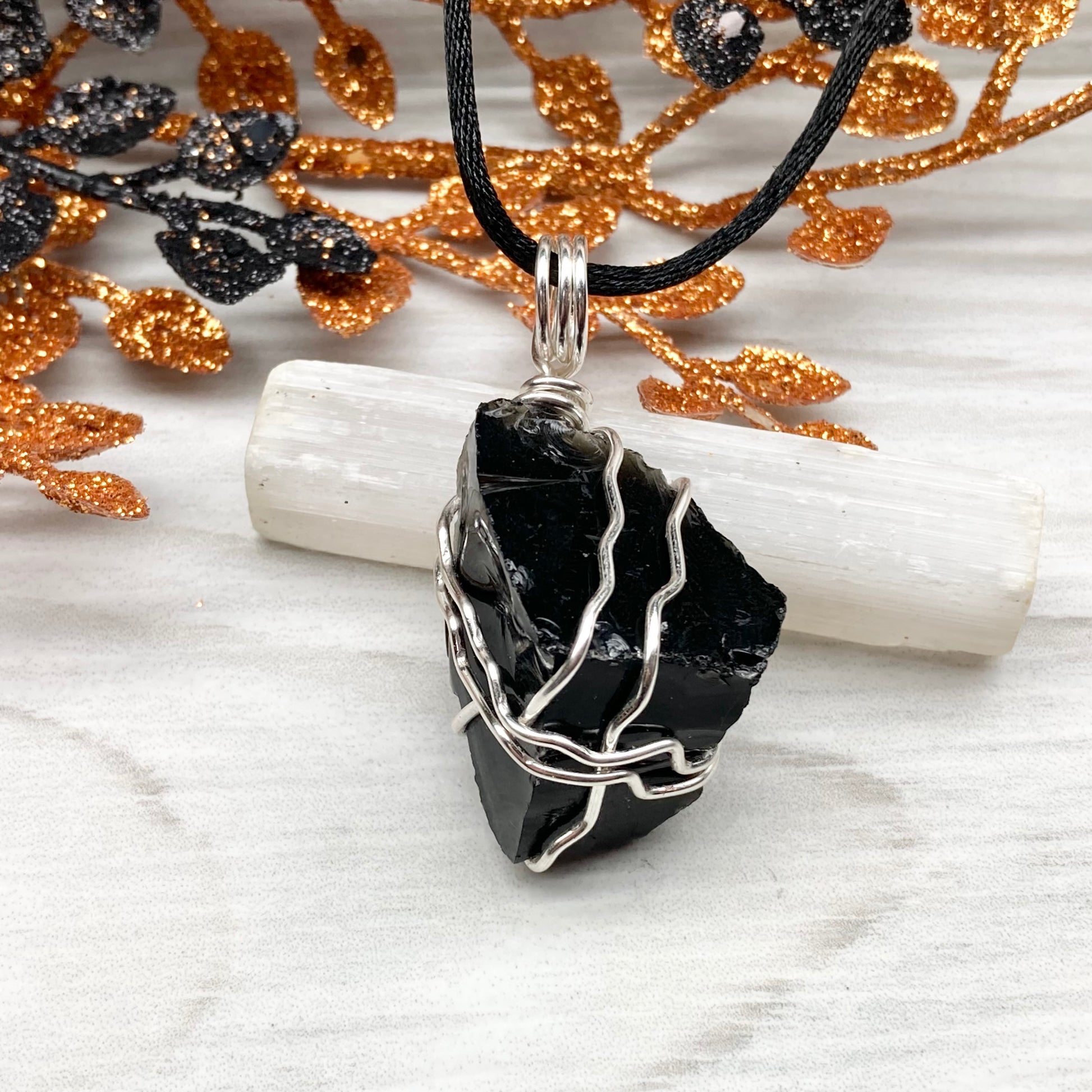 Real Black Obsidian necklace. Obsidian crystal wrapped with silver colored copper wire. Comes on a black chain. Raw Obsidian stone pendant. New age jewelry.