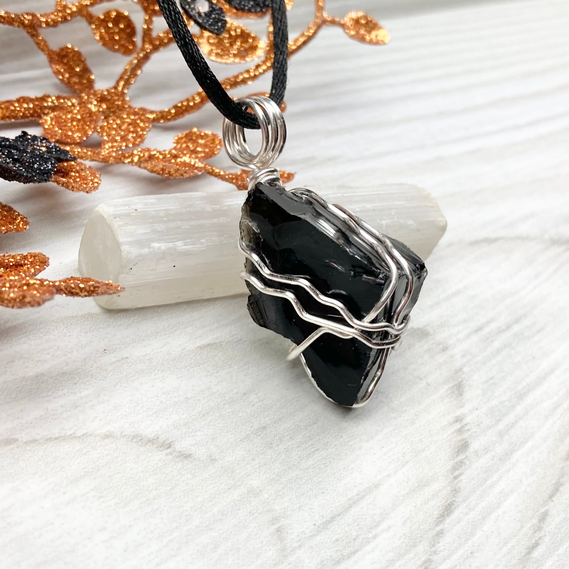 Real Black Obsidian necklace. Obsidian crystal wrapped with silver colored copper wire. Comes on a black chain. Raw Obsidian stone pendant. New age jewelry.