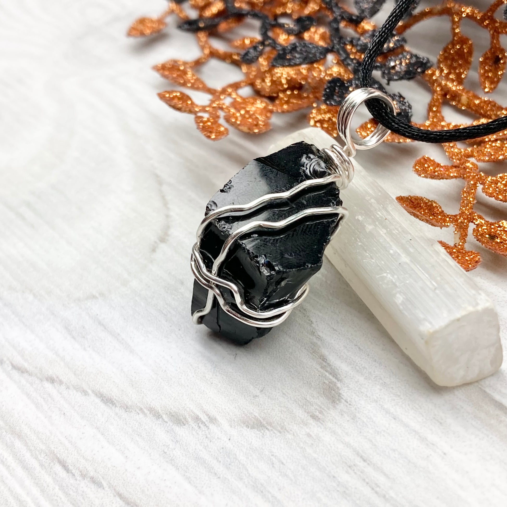 Real Black Obsidian necklace. Obsidian crystal wrapped with silver colored copper wire. Comes on a black chain. Raw Obsidian stone pendant. New age jewelry.