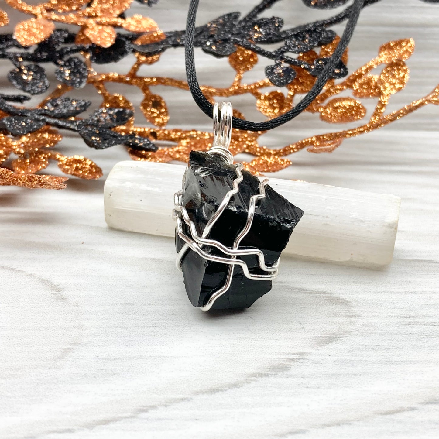 Real Black Obsidian necklace. Obsidian crystal wrapped with silver colored copper wire. Comes on a black chain. Raw Obsidian stone pendant. New age jewelry.