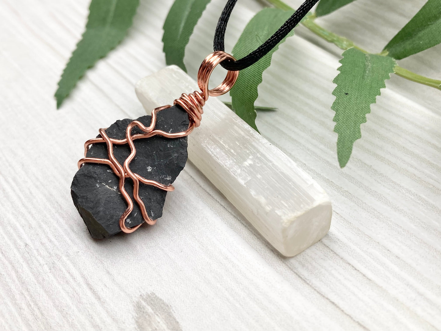 Black Onyx necklace. Raw Onyx wrapped with tarnish resistant copper wire. Comes on a black chain. Black stone wire wrapped pendant. 