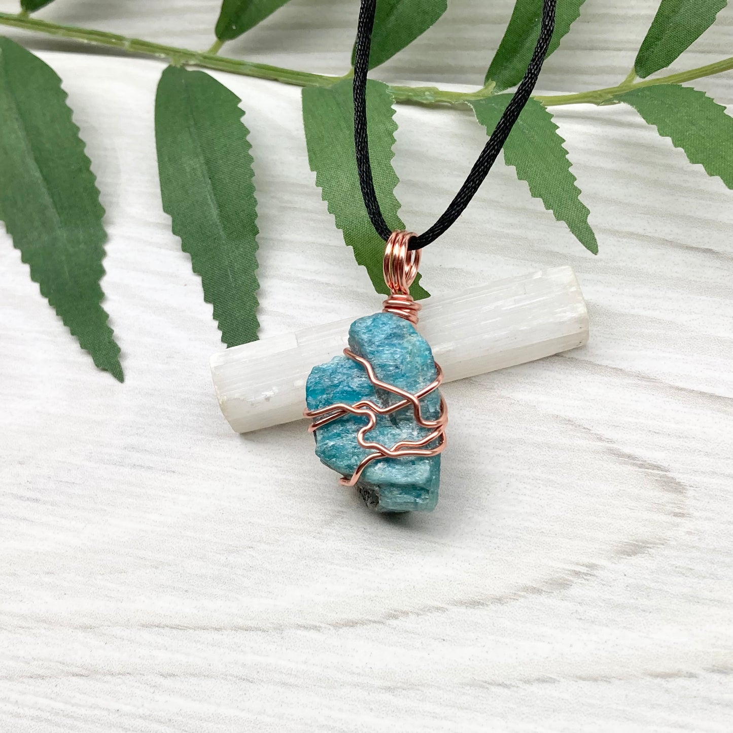 Blue Apatite Necklace. Raw Blue Apatite Stone Wrapped With Tarnish Resistant Copper Wire. This Pendant Was Handcrafted During The Moon In Scorpio. Comes On A Black Chain. Spiritual Jewelry For Him Or Her.