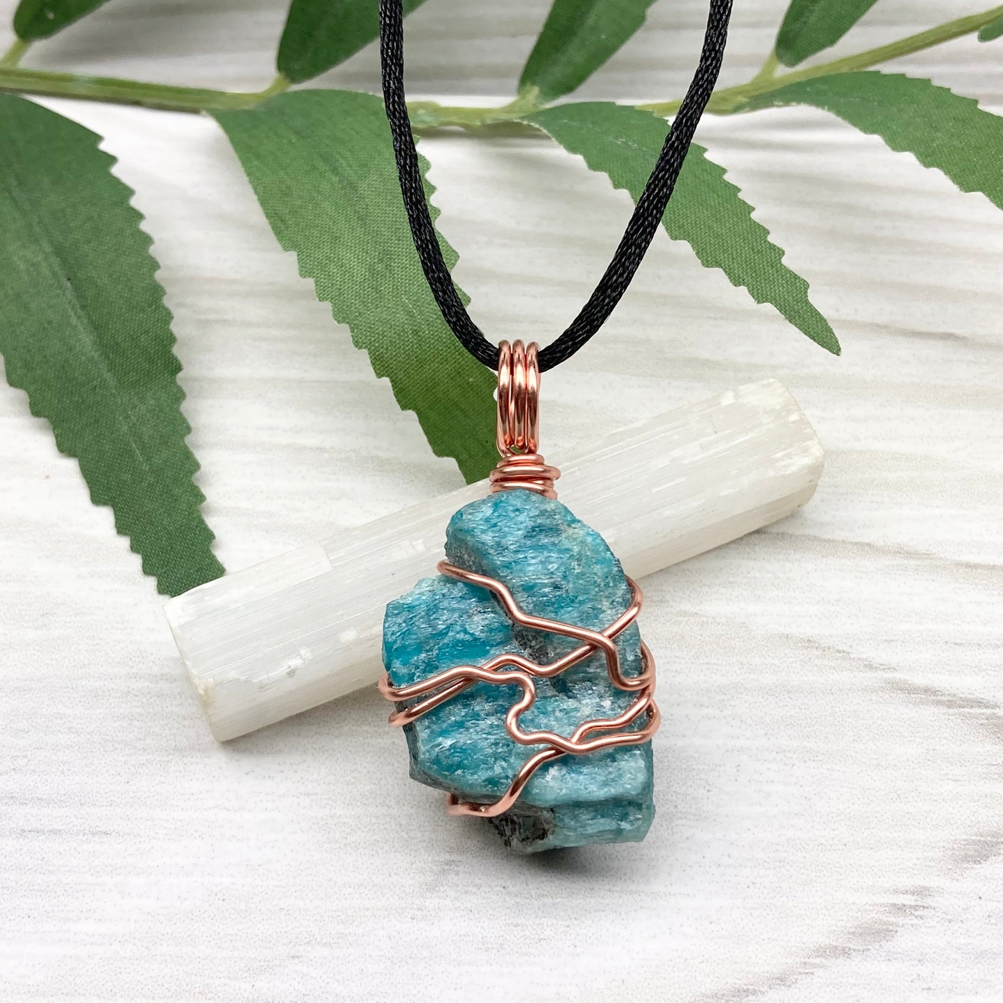 Blue Apatite Necklace. Raw Blue Apatite Stone Wrapped With Tarnish Resistant Copper Wire. This Pendant Was Handcrafted During The Moon In Scorpio. Comes On A Black Chain. Spiritual Jewelry For Him Or Her.