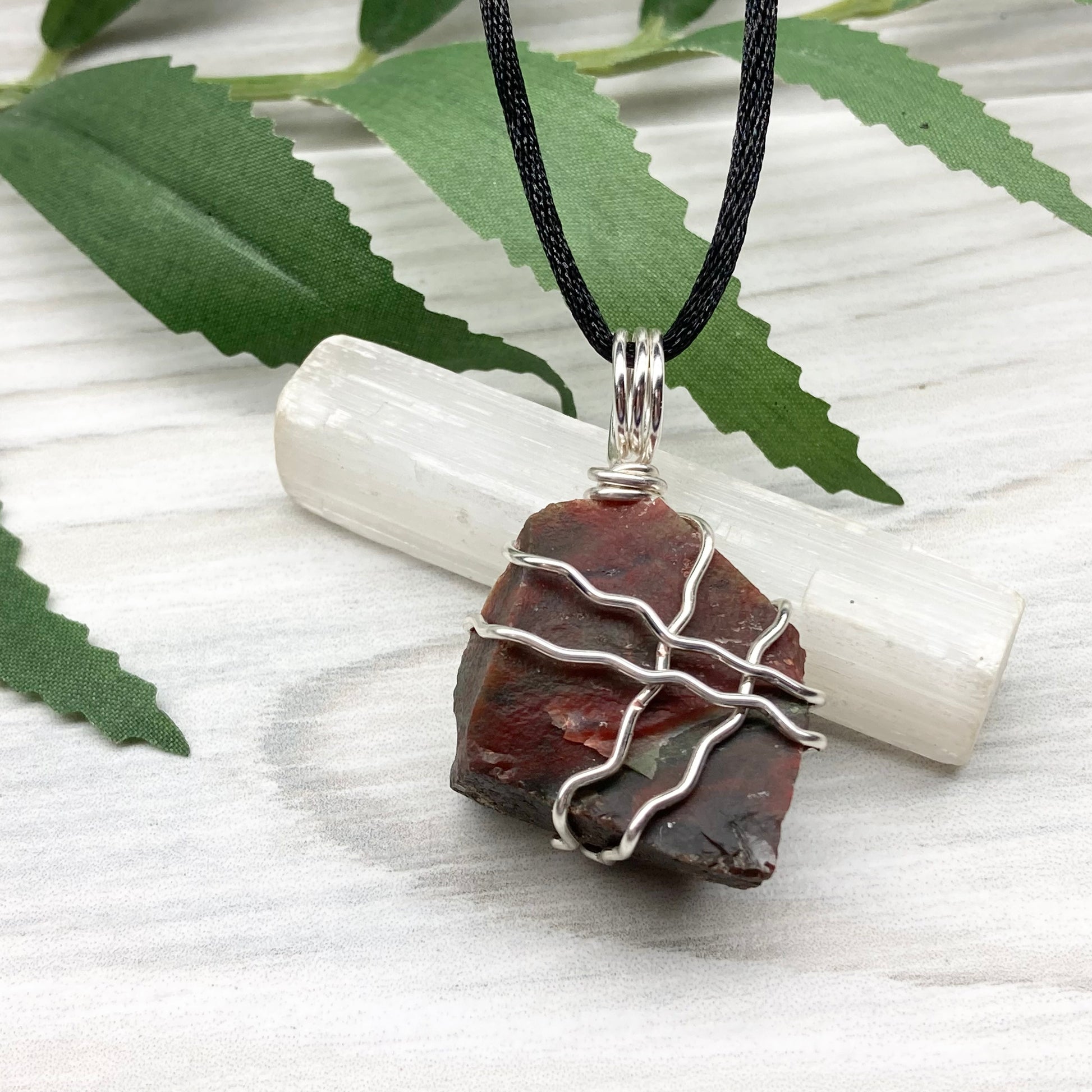 Fancy Jasper necklace. Raw Fancy Jasper stone wrapped with silver colored copper wire. Comes on a black chain. Wire wrapped crystal pendant. Green and red gemstone. Aries zodiac jewelry.