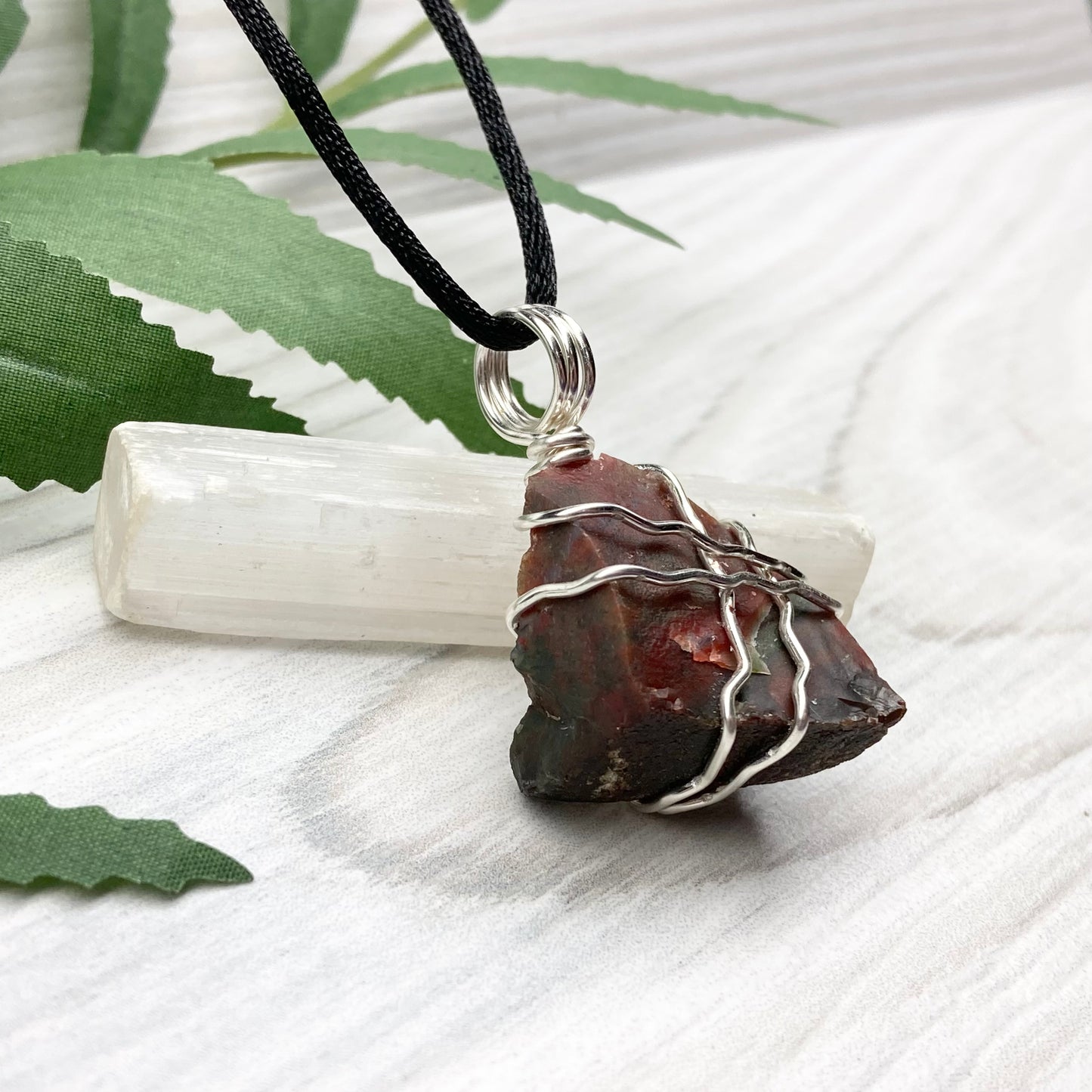 Fancy Jasper necklace. Raw Fancy Jasper stone wrapped with silver colored copper wire. Comes on a black chain. Wire wrapped crystal pendant. Green and red gemstone. Aries zodiac jewelry.