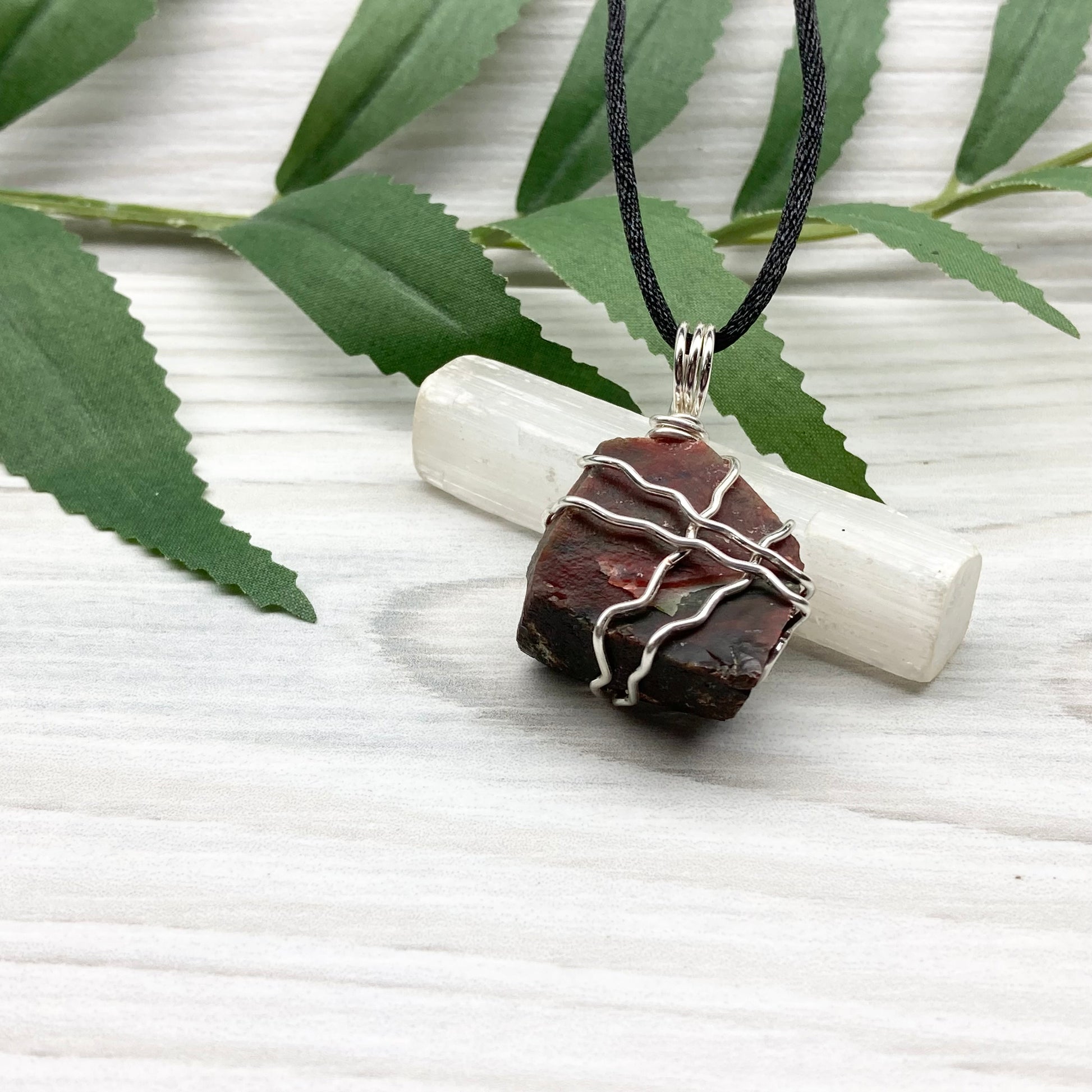 Fancy Jasper necklace. Raw Fancy Jasper stone wrapped with silver colored copper wire. Comes on a black chain. Wire wrapped crystal pendant. Green and red gemstone. Aries zodiac jewelry.