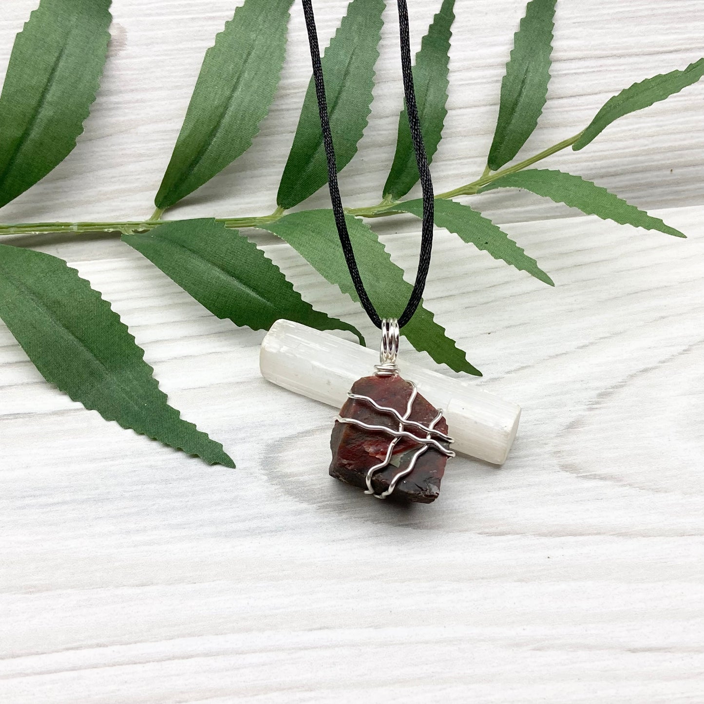 Fancy Jasper necklace. Raw Fancy Jasper stone wrapped with silver colored copper wire. Comes on a black chain. Wire wrapped crystal pendant. Green and red gemstone. Aries zodiac jewelry.