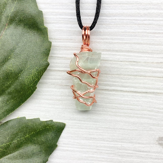 Green Calcite Necklace. Light green crystal wrapped with tarnish resistant copper wire. Comes on a black chain. Raw stone pendant. Virgo zodiac gift. New age jewelry for him or her. 