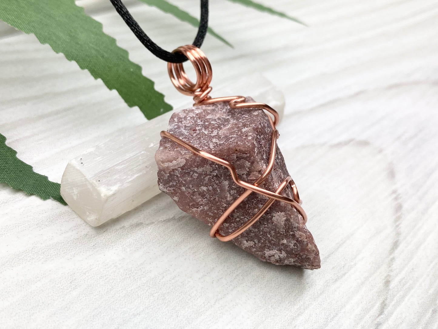 Natural Guava Quartz Necklace. This Crystal Is Hand Wrapped With Copper Wire. Stone is a Purple Brown Color. Comes On A Black Chain. Peace And Harmony Gemstone.