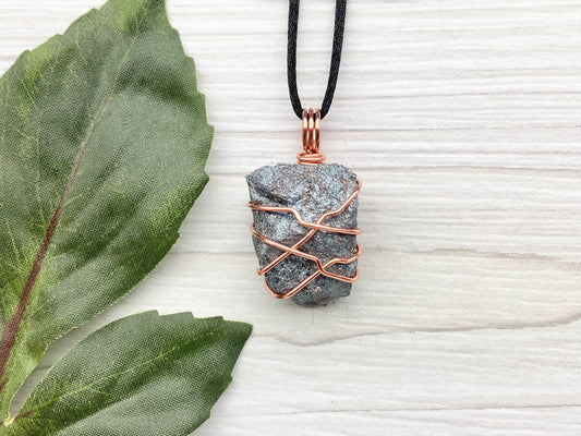 Raw Hematite Necklace. Gray Metallic Colored Stone Hand Wrapped With Pure Copper Wire. Comes On A Black Chain. New Age Jewelry For Him Or Her. Aquarius Zodiac Gemstone.