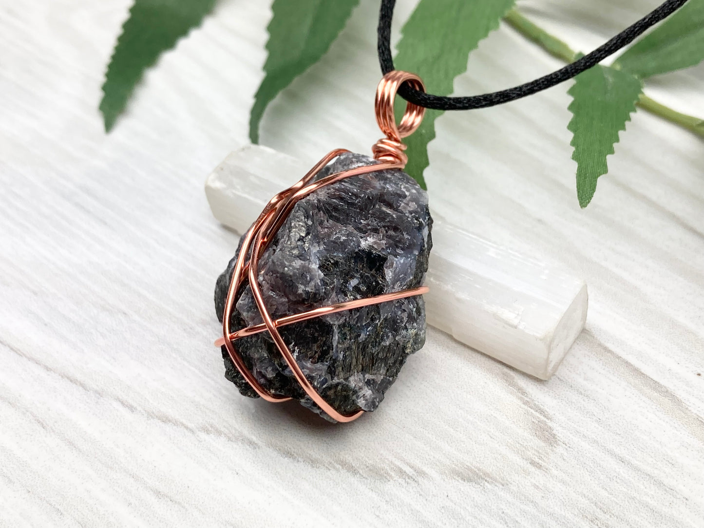 Indigo Gabbro Stone Necklace. Indigo Gabbro Crystal Wrapped With Tarnish Resistant Copper Wire. Also Known As Mystic Merlinite. Comes On A Black Chain. 
