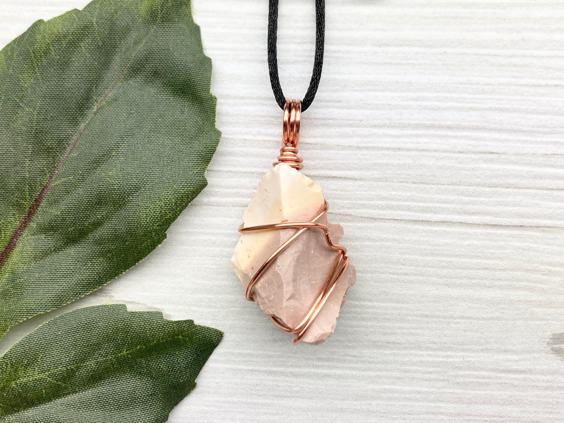 Raw Mookaite Jasper Necklace. Cream and Light Brown Crystal Wrapped With Tarnish Resistant Copper Wire. Comes On A Black Satin Silk Chain. Handcrafted During The Moon In Aries.