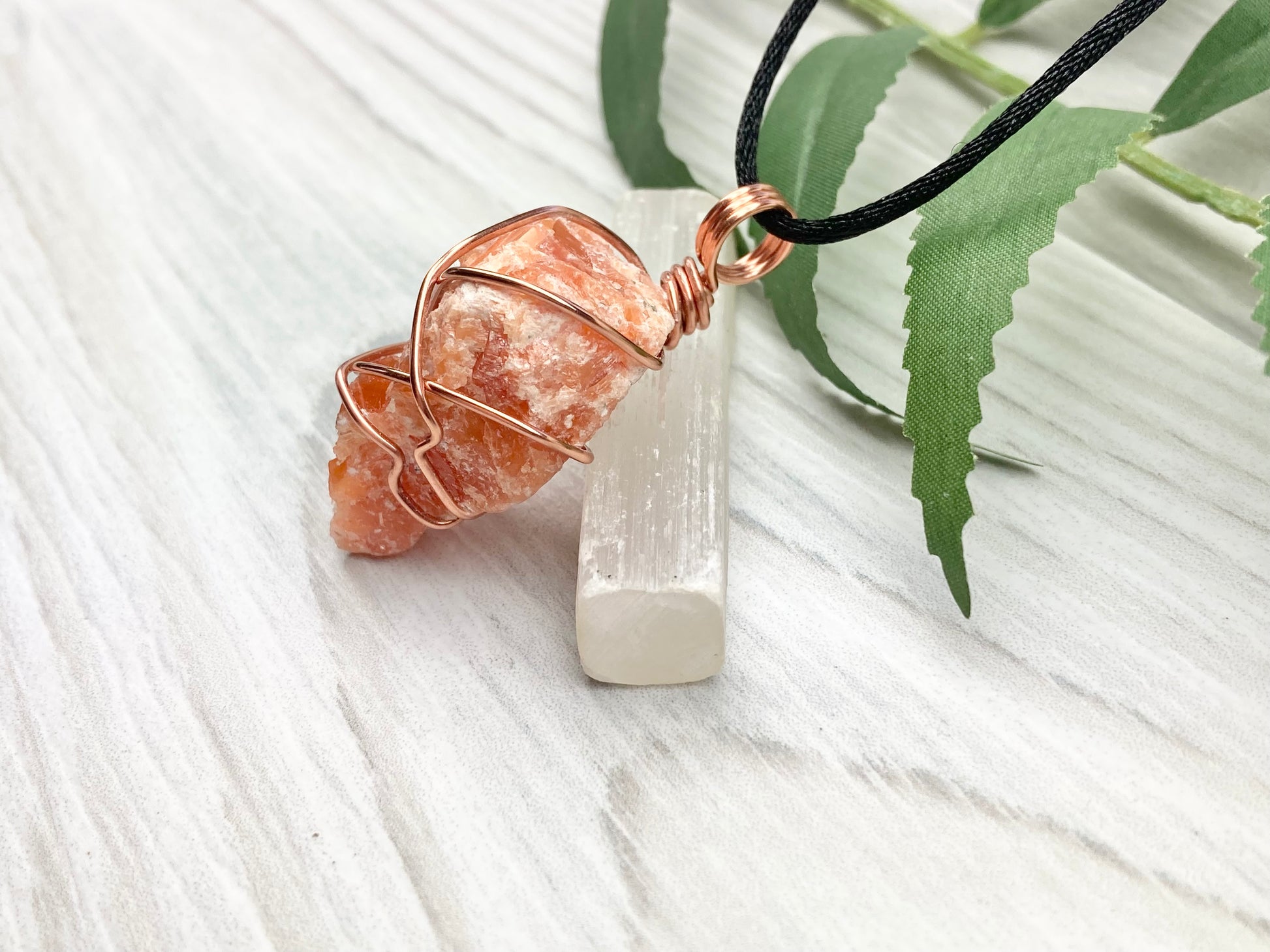 Orange Calcite Necklace. Raw Orange Calcite Crystal Wrapped With Copper Wire That Is Tarnish Resistant. Comes On A Black Necklace. Gemini Zodiac Stone Pendant. Handmade In Tennessee. Pagan Spiritual Jewelry.