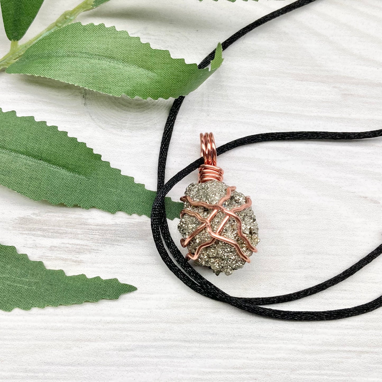 Raw Pyrite Necklace. Real Pyrite Stone Hand Wrapped With Copper Wire. Fools Gold Crystal Pendant. Comes On A Black Chain. Leo And Taurus Zodiac Jewelry. Handmade In Tennessee.