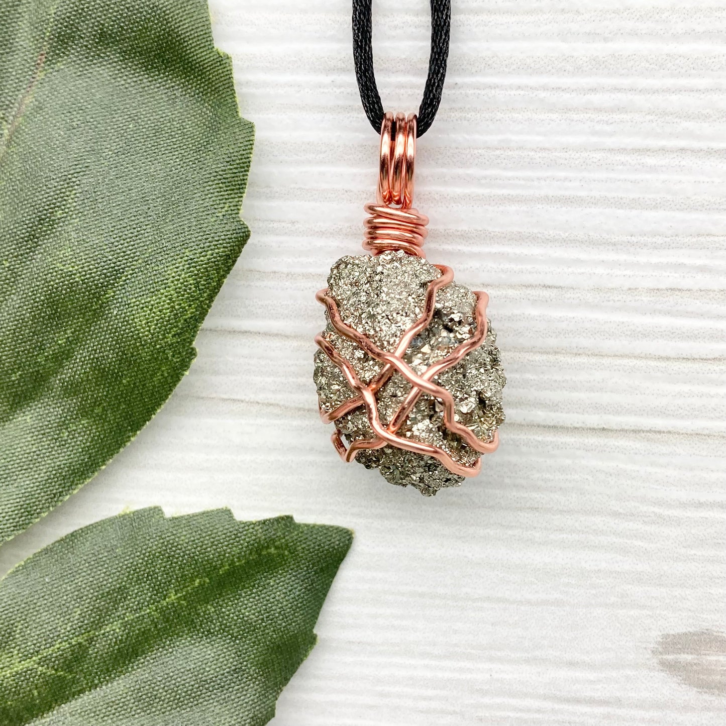 Raw Pyrite Necklace. Real Pyrite Stone Hand Wrapped With Copper Wire. Fools Gold Crystal Pendant. Comes On A Black Chain. Leo And Taurus Zodiac Jewelry. Handmade In Tennessee.