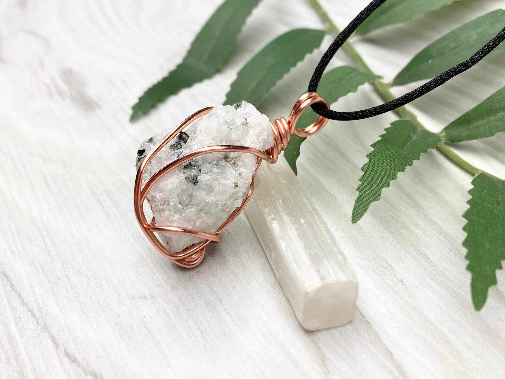 Rainbow Moonstone Necklace. White And Black Crystal Wrapped With Copper Wire. Comes On A Black Chain. This Stone Is Associated With The Third Eye Chakra.