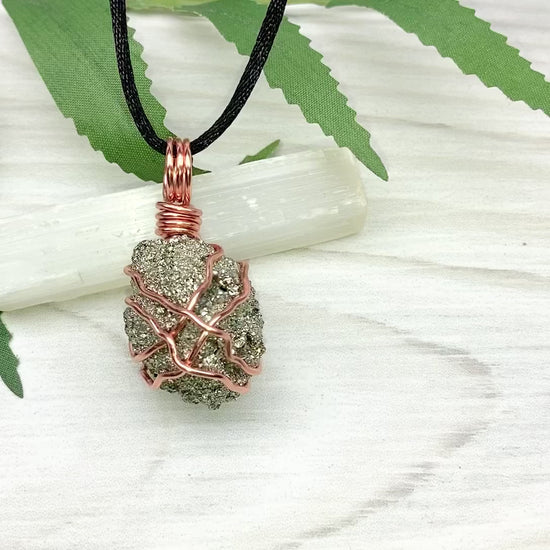 Raw Pyrite Necklace. Real Pyrite Stone Hand Wrapped With Copper Wire. Fools Gold Crystal Pendant. Comes On A Black Chain. Leo And Taurus Zodiac Jewelry. Handmade In Tennessee.