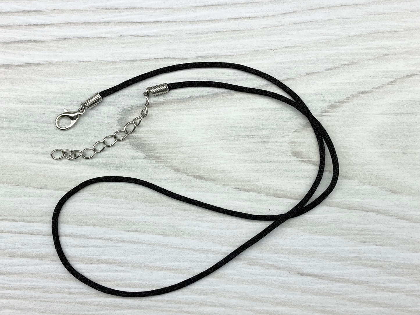 Black Necklace Pendant Comes On.