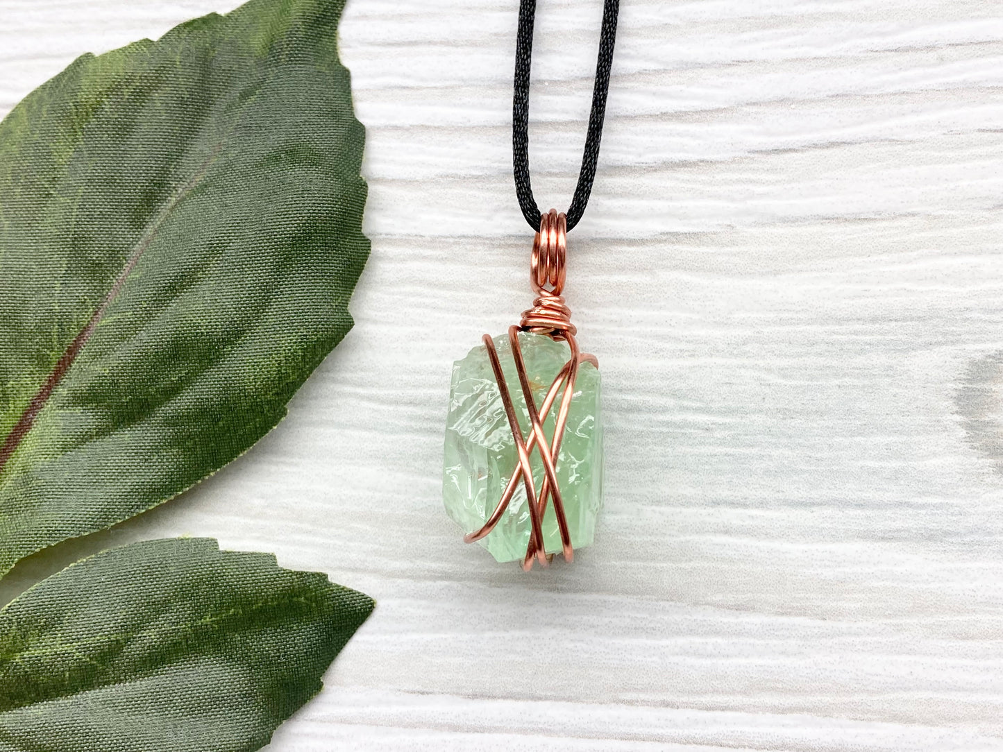 Green Calcite Necklace. Copper Wire Wrapped Stone Pendant. Raw Light Green Crystal. Comes On A Black Chain. Hand Crafted Metaphysical Jewelry For Him Or Her.