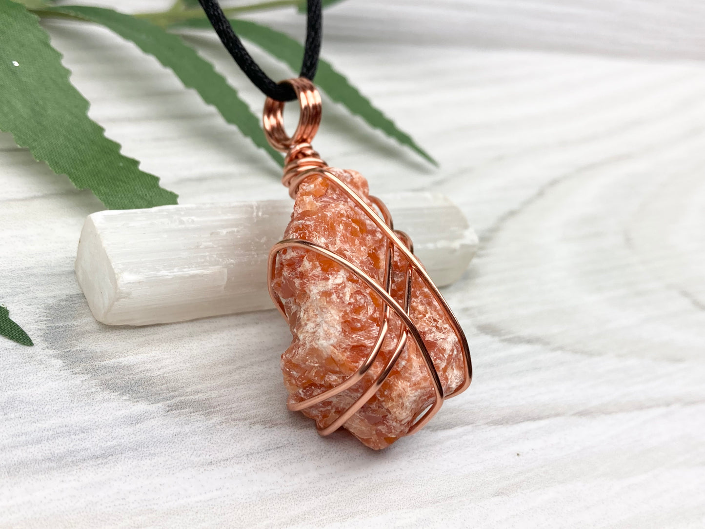 Raw Orange Calcite Necklace. Natural Orange Crystal Hand Wrapped With Copper Wire. Comes On A Black Chain. Leo Zodiac Stone Pendant. New Age Metaphysical Jewelry. Fire Element Gemstone.