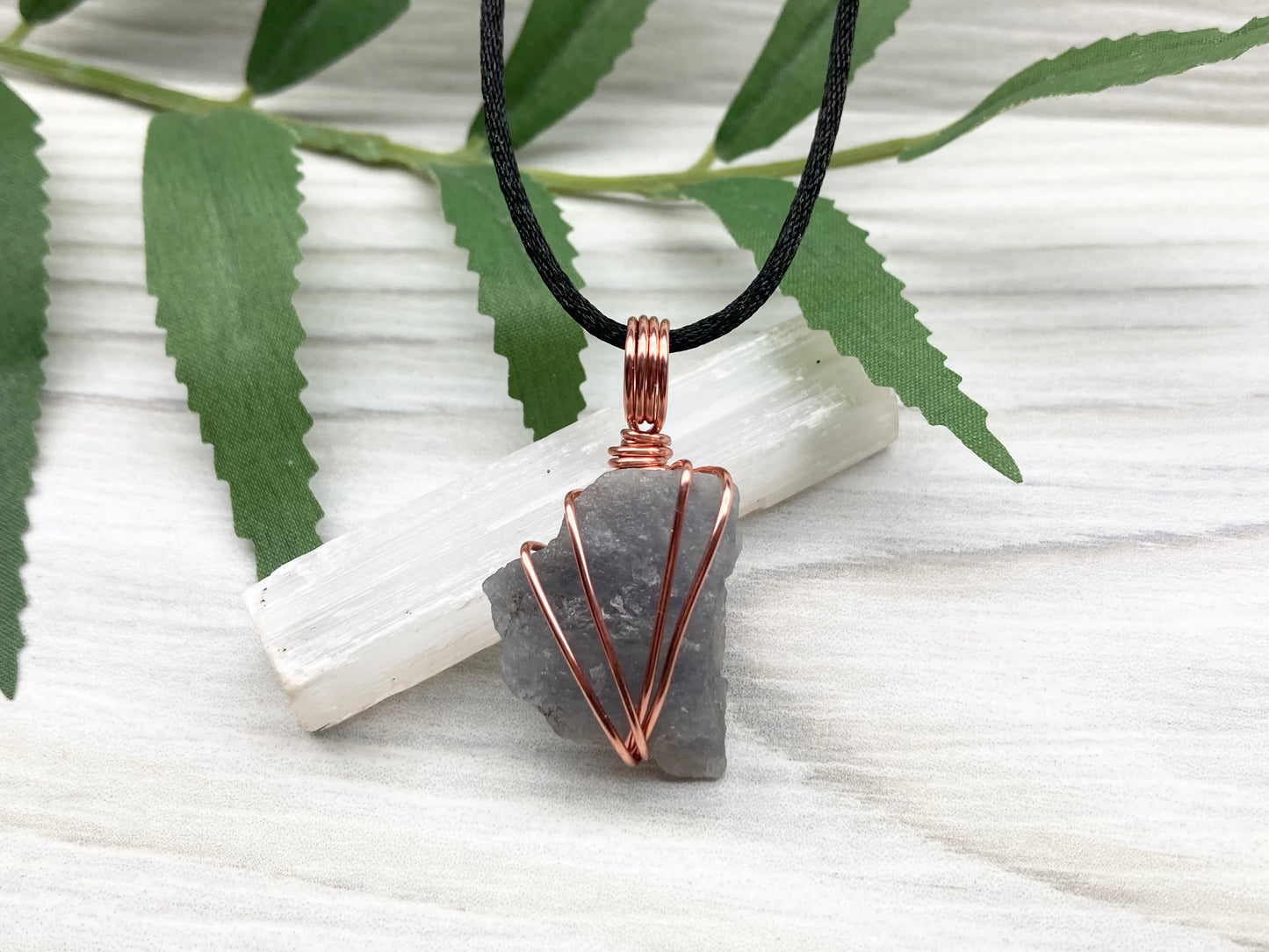 Raw Iolite Necklace. Natural Iolite Crystal Wrapped With Pure Copper Wire.This Stone Is A Blue Purple Color. Comes On A Black Chain. New Age Sagittarius Pendant.