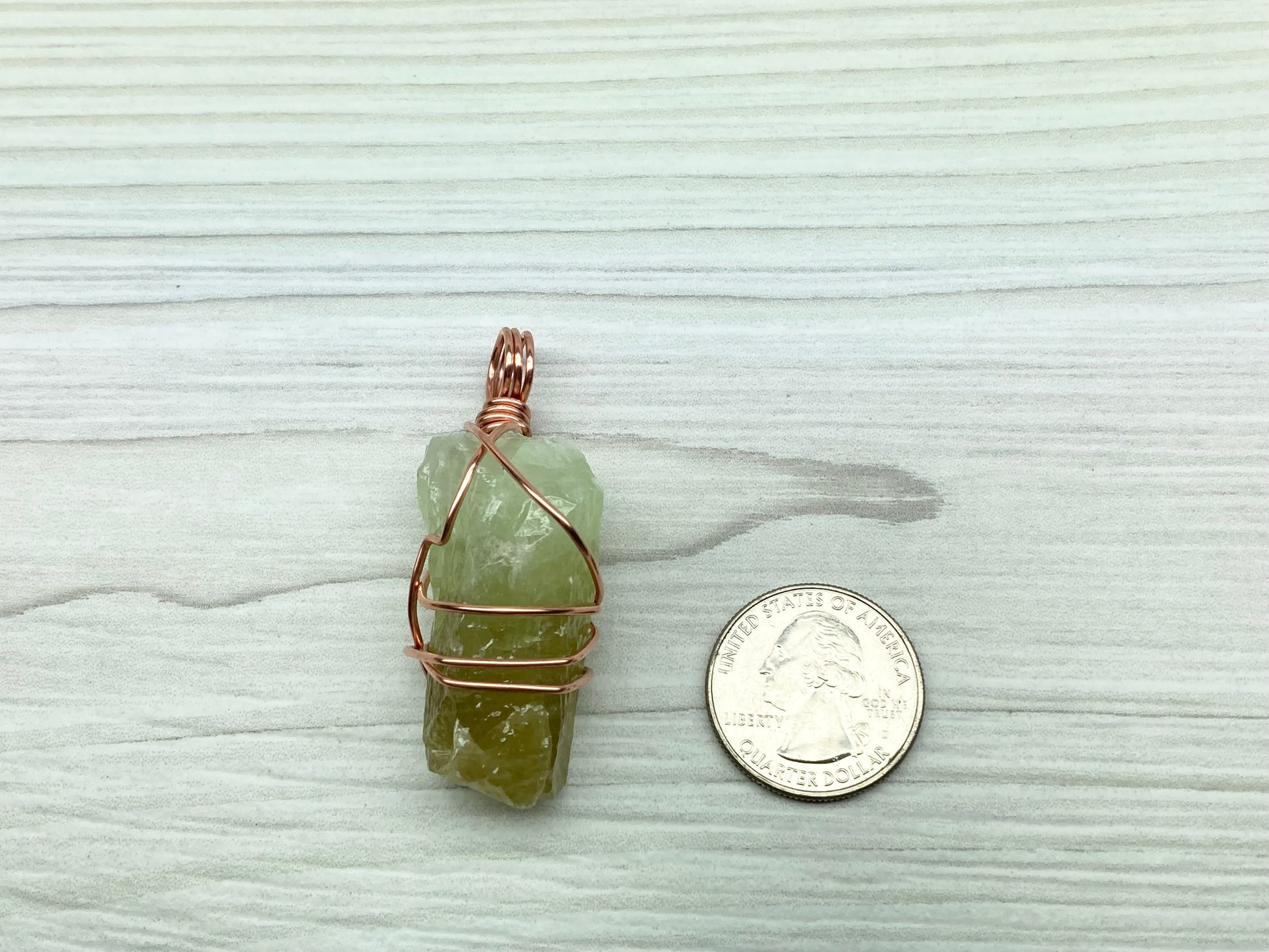 Green Calcite Necklace. Copper Wire Wrapped Stone Pendant. Raw Green Crystal. Stone Has Light Green At The Top And Dark Green At The Bottom. Comes On A Black Chain. Hand Crafted Spiritual Jewelry For Him Or Her.