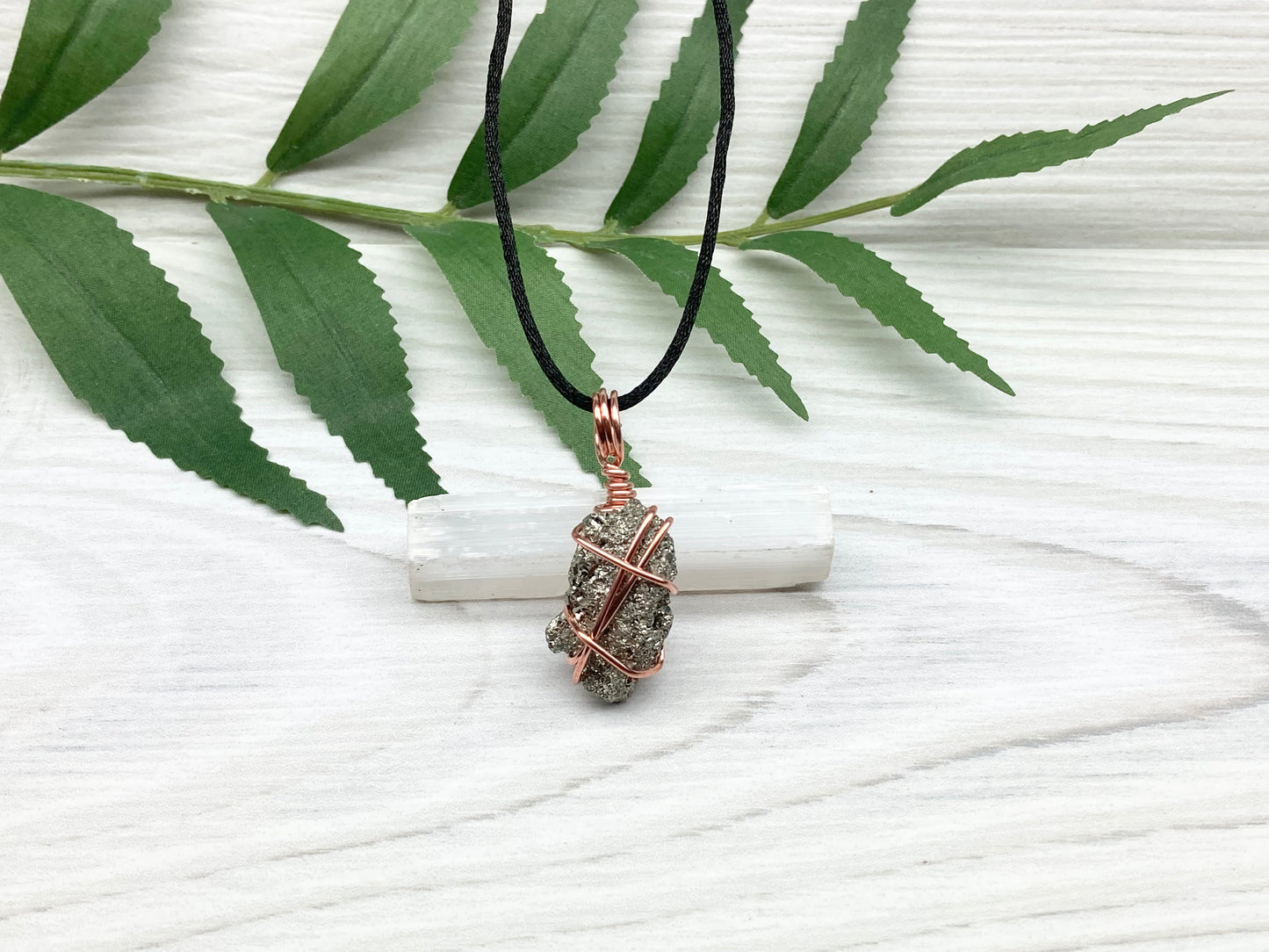 Raw Pyrite Necklace. Real Pyrite Stone Hand Wrapped With Copper Wire. Fools Gold Crystal Pendant. Comes On A Black Chain. Leo And Taurus Zodiac Jewelry. Handmade In Tennessee.