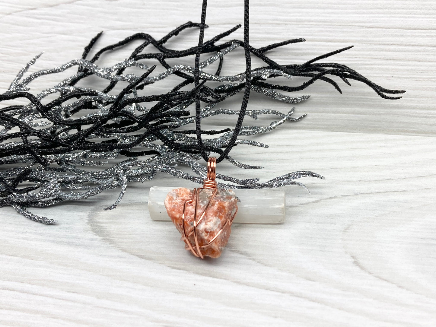 Natural Raw Orange Calcite Crystal Hand Wrapped With Tarnish Resistant Copper Wire. Comes On A Black Chain. Crystal Is Orange With A Bit Of Blue On The Top.Pendant Handcrafted During The Moon In Sagittarius. New Age Style Jewelry.