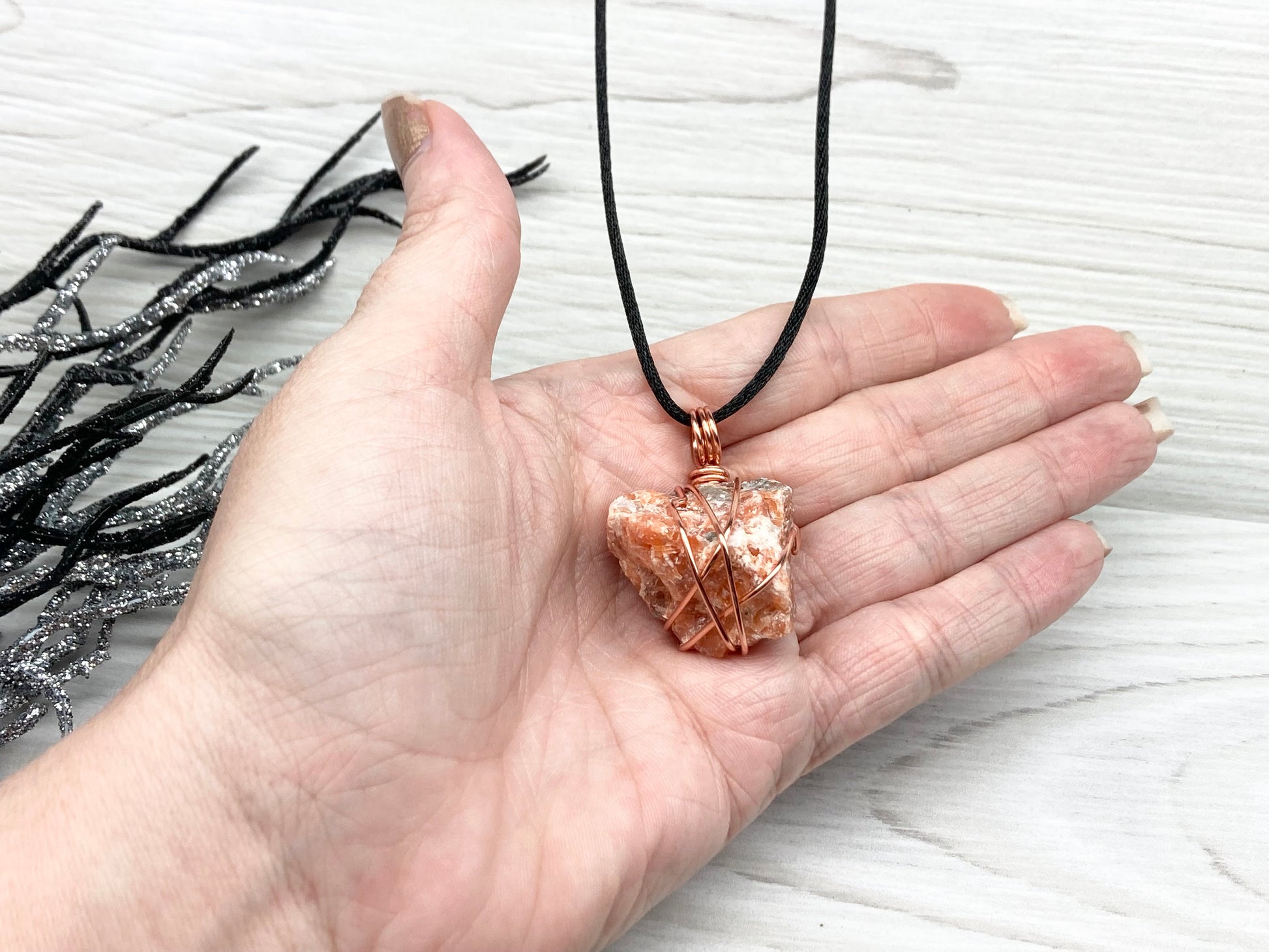 Natural Raw Orange Calcite Crystal Hand Wrapped With Tarnish Resistant Copper Wire. Comes On A Black Chain. Crystal Is Orange With A Bit Of Blue On The Top.Pendant Handcrafted During The Moon In Sagittarius. New Age Style Jewelry.