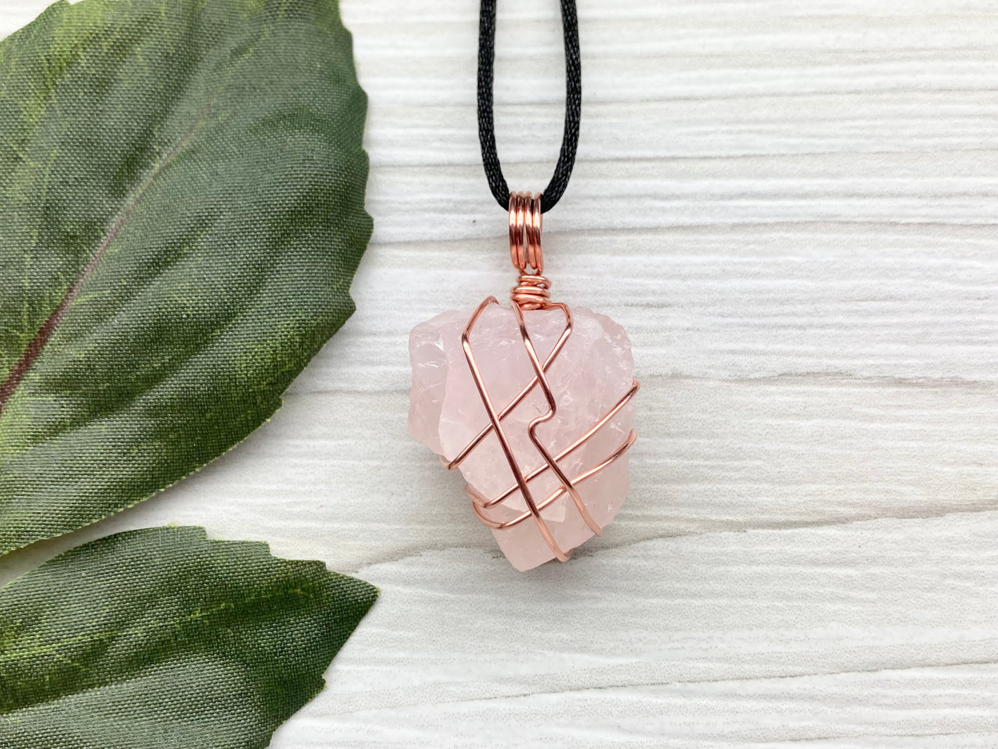 Raw Rose Quartz Necklace. Light Pink Crystal Wrapped With Copper Wire. Comes On A Black Chain. Capricorn Zodiac Stone Jewelry. New Age Boho Style.