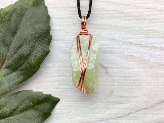 Green Calcite Necklace. Copper Wire Wrapped Stone Pendant. Raw Light Green Crystal. Comes On A Black Chain. Hand Crafted Gemstone Jewelry For Him Or Her.